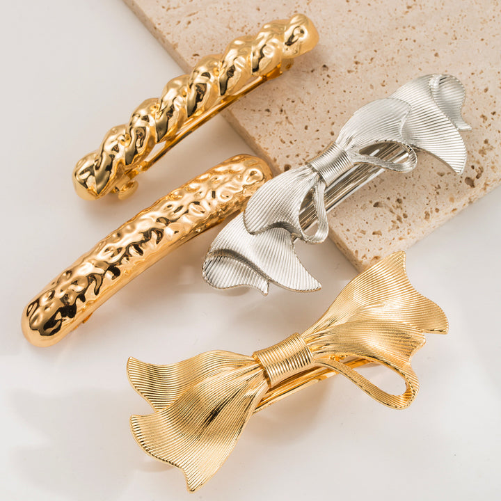 Bow Twist Strip Alloy Spring Ponytail Hair Clip Hair Accessories Wholesale