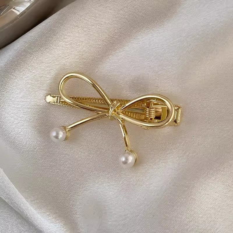 Alloy Bow Inlaid Pearl Bangs Duckbill Hair Clip Hair Accessories Wholesale