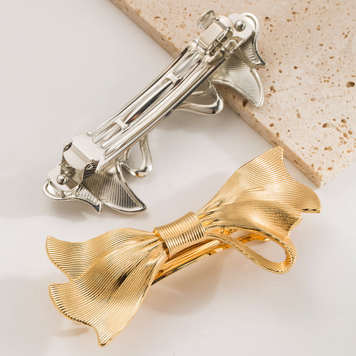 Bow Twist Strip Alloy Spring Ponytail Hair Clip Hair Accessories Wholesale